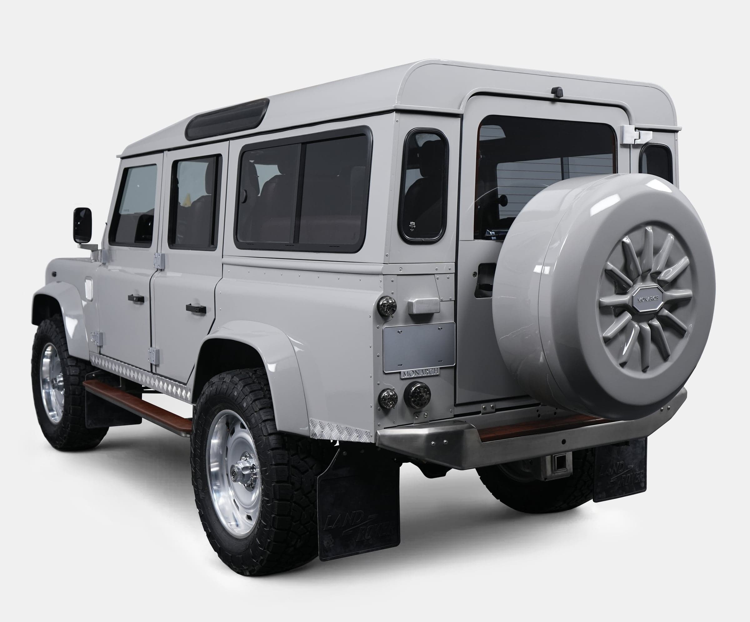 Custom Land Rover Defender in sleek gray with distinctive design features