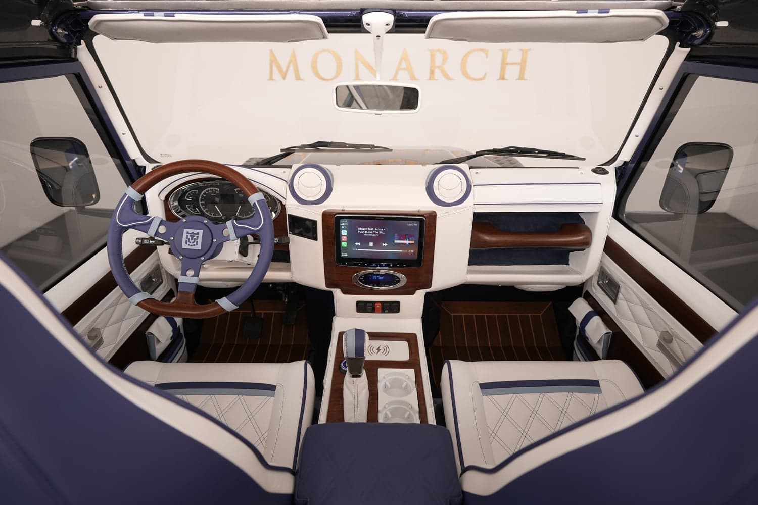 Interior Shot: Luxury Cabin Bespoke Land Rover Defender interior featuring premium materials and modern technology