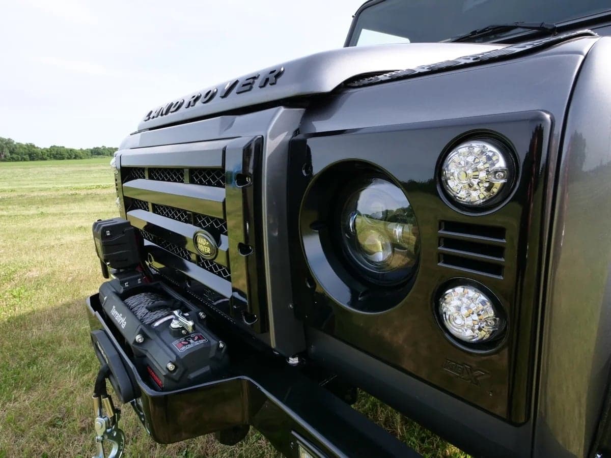 Close-up: Custom Land Rover Front End Close-up of a bespoke Land Rover Defender front end with black grille and LED lights