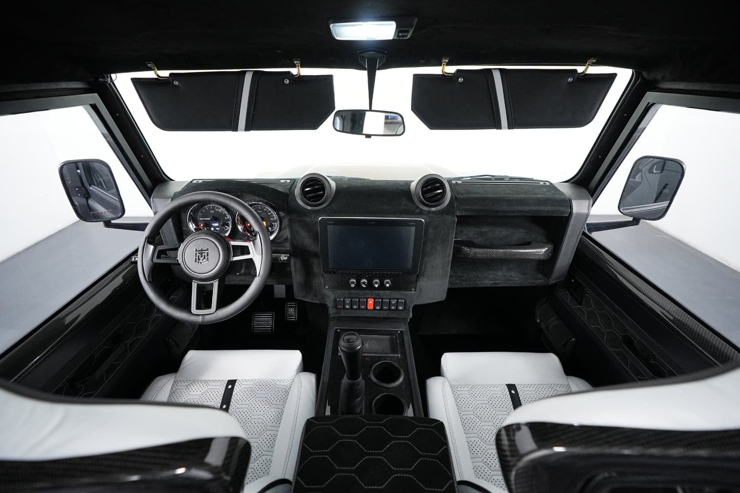 Interior Shot: Premium Cabin Luxury Land Rover Defender interior with custom design features
