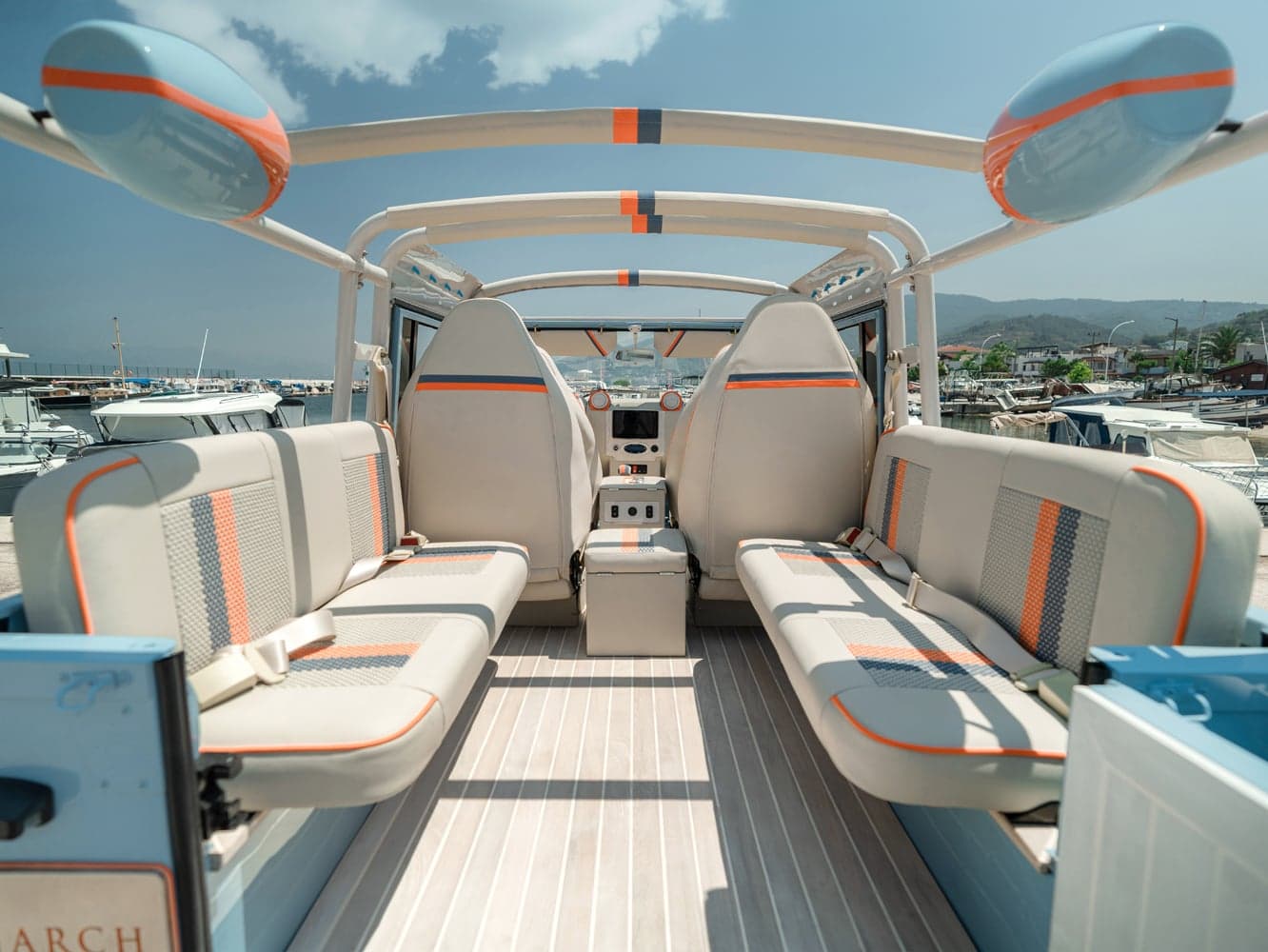 Interior Shot: Open-Air Adventure Open-air interior of a custom Land Rover Defender with luxury seating