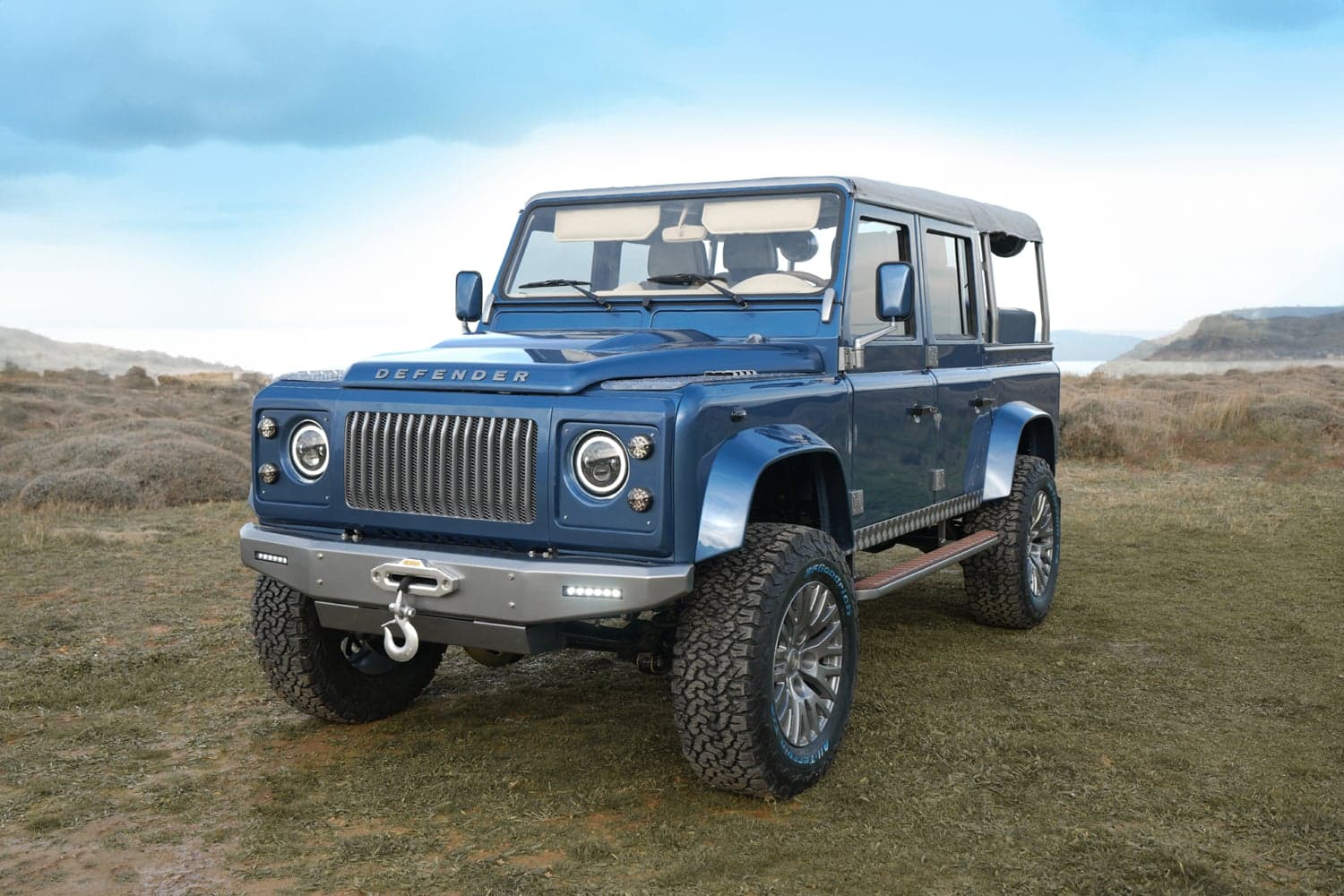 Front View: Bespoke Land Rover Defender Custom blue Land Rover Defender with luxury design details