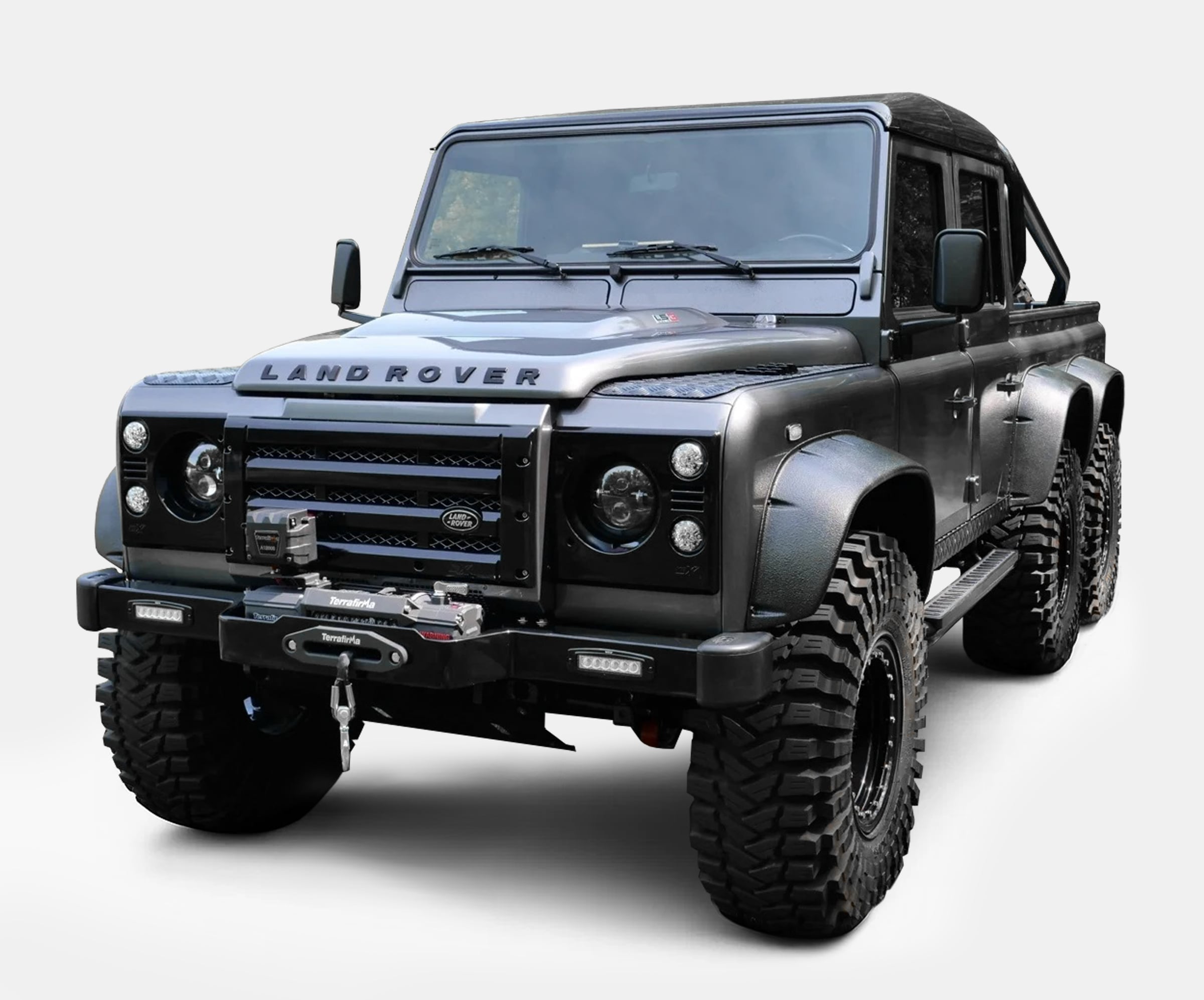 Front View: Custom Land Rover Defender Front view of a bespoke Land Rover Defender with rugged features and off-road tires