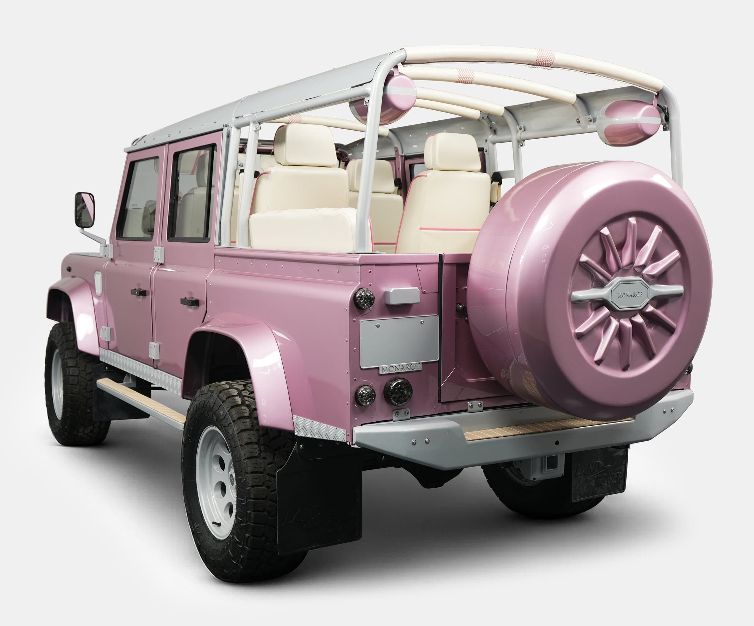 Studio Photo: Custom Pink Land Rover Defender Custom pink Land Rover Defender with luxury interior and unique styling