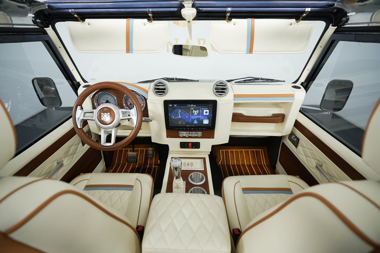 Interior Shot: Luxury Cabin Design Bespoke Land Rover Defender interior featuring premium materials and modern technology