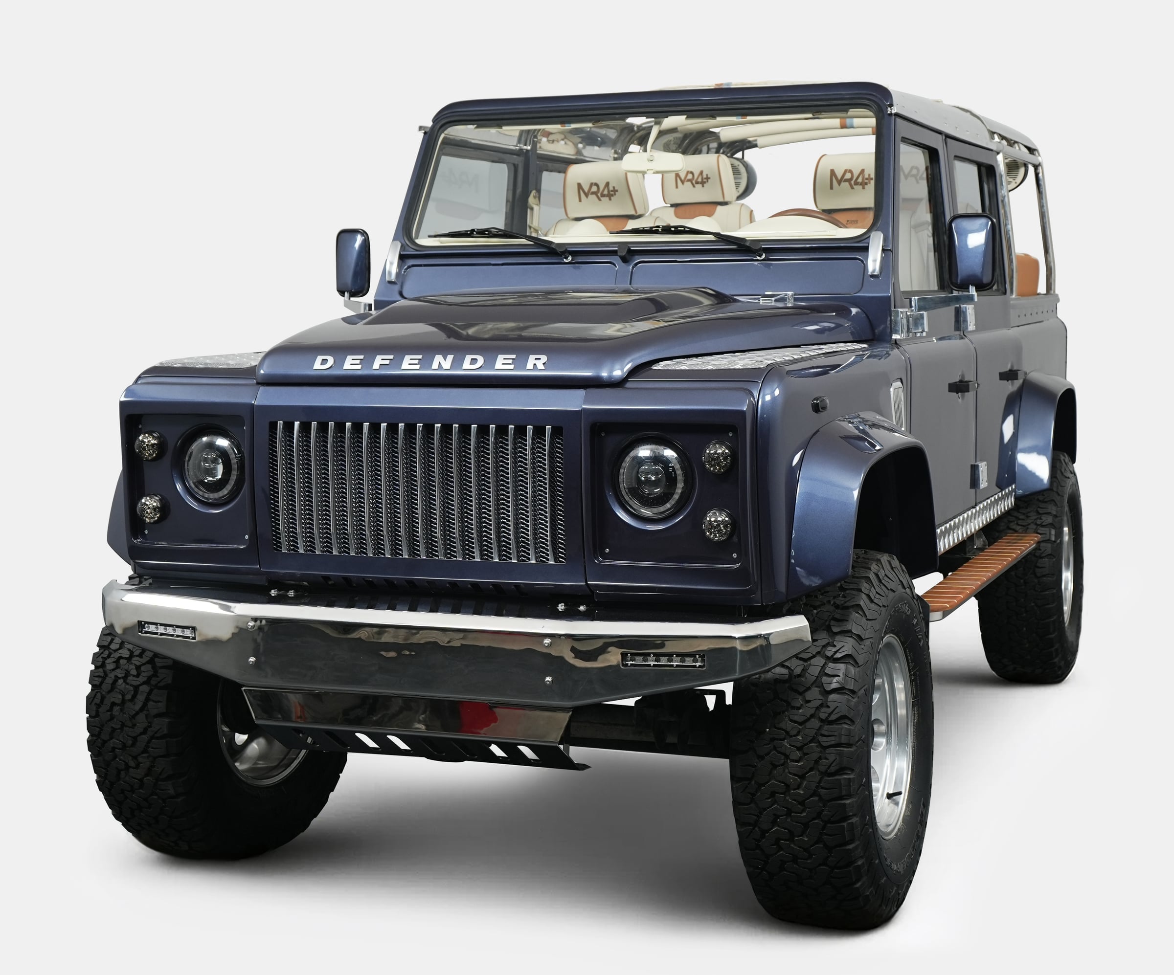 Front View: Bespoke Land Rover Defender Custom Land Rover Defender in dark blue with luxury finishes