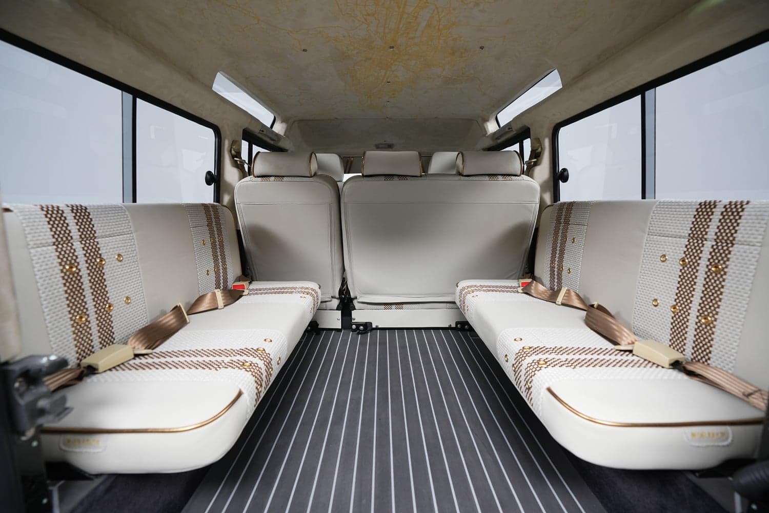 Interior Shot: Luxury Seating Interior of a bespoke Land Rover Defender showcasing luxury seating and design details